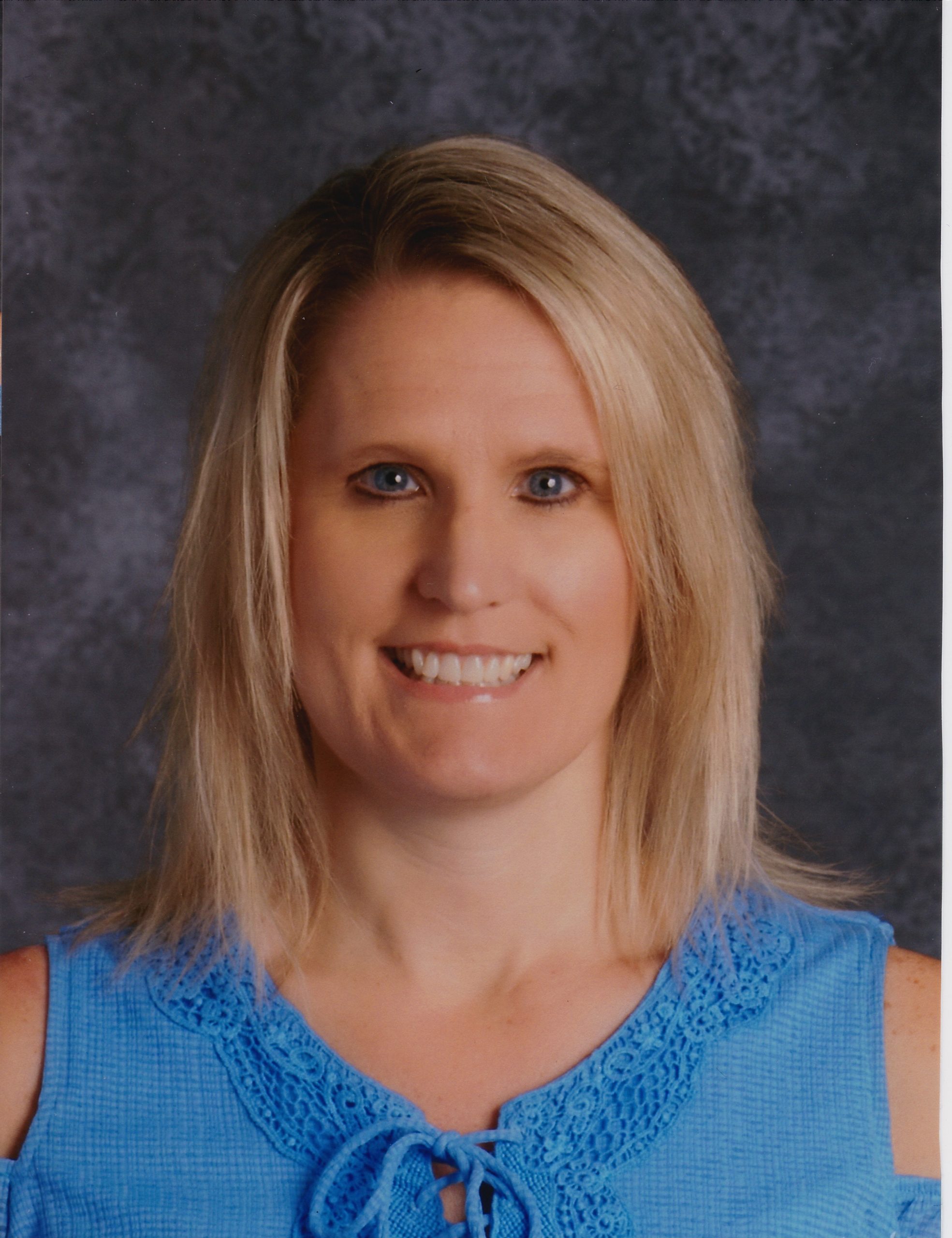 Kristi Headshot-credit-suite-staff-photo