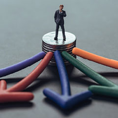 sba loan options credit suite 6 small man on coin stack with multicolored arrows